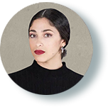 Hispanic woman with dark hair in a black top